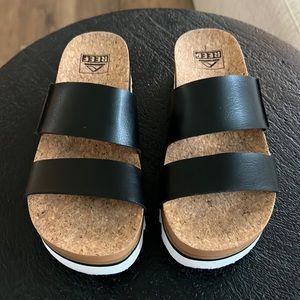 Black and white reef platform sandals